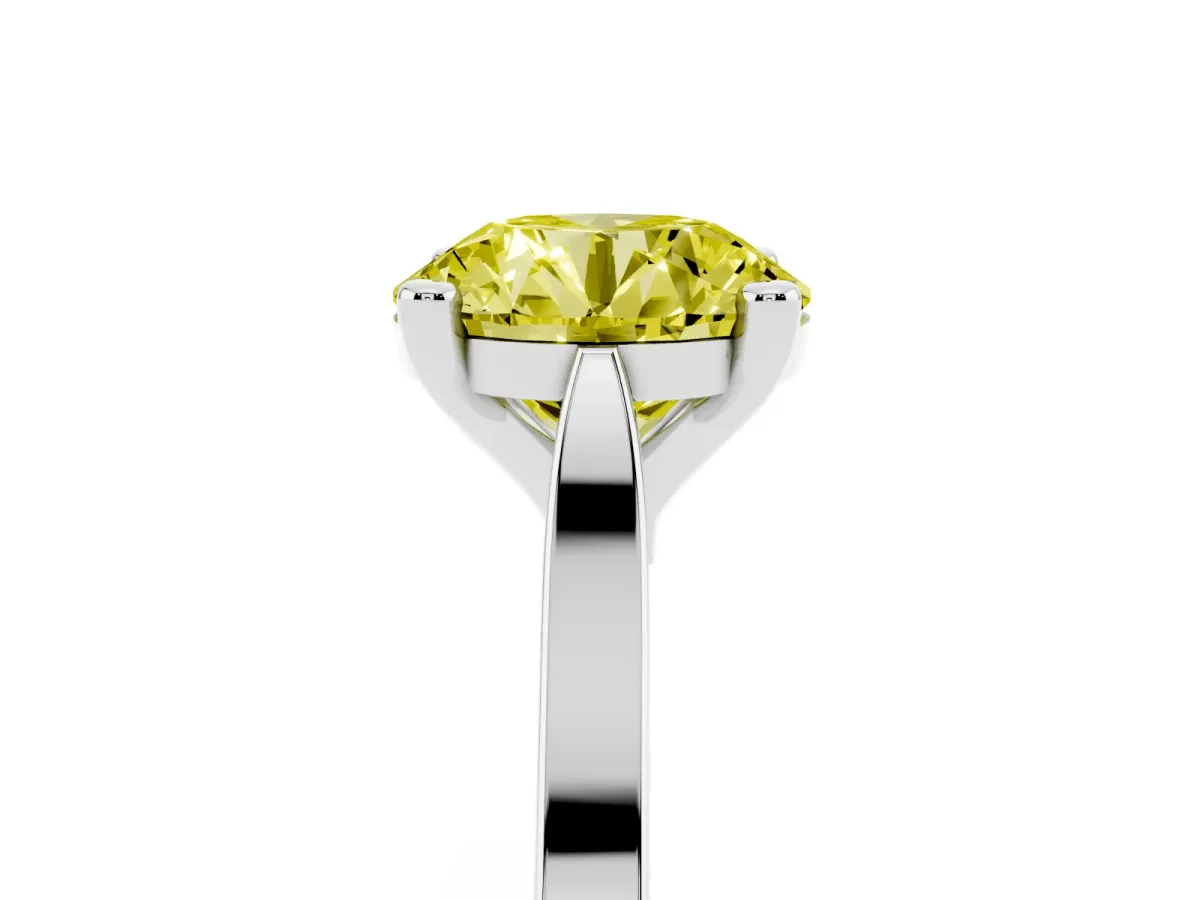Fancy Yellow Round Cut Solitaire Diamond Ring with Four-Prong Setting and Tapered Band Silver