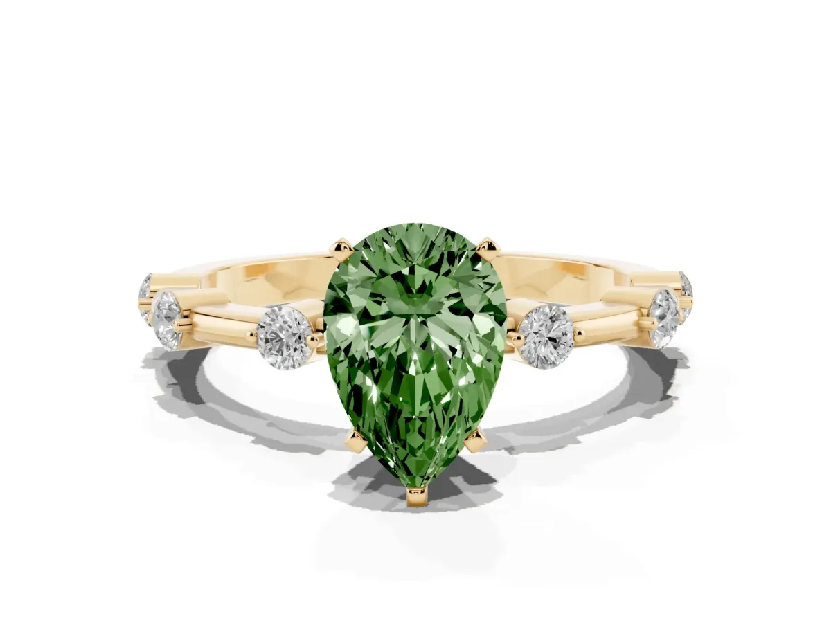 Fancy Green Pear Cut Solitaire Diamond Ring with Bezel Set Side Stones and Prong Setting Yellow gold