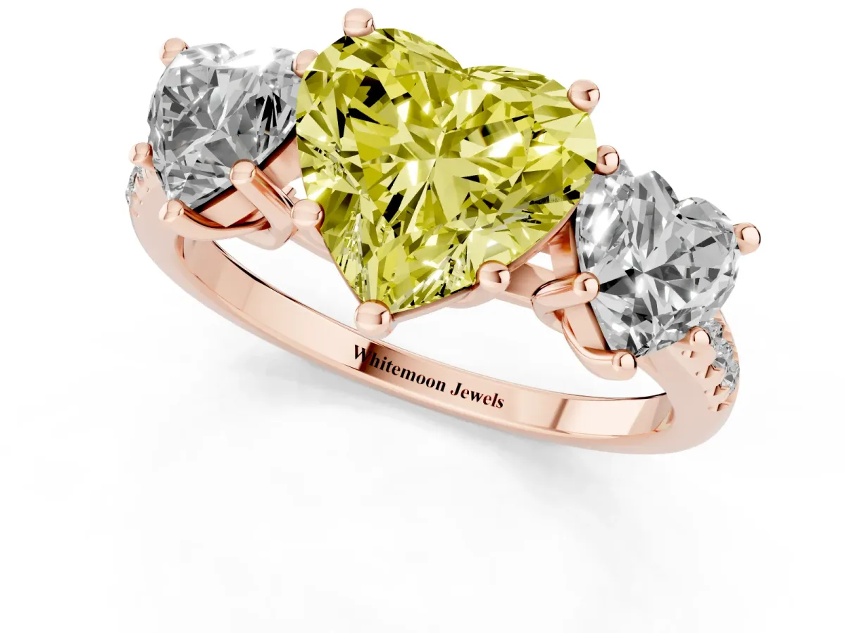 Fancy Yellow Three-Stone Heart Cut Diamond Ring with Round Pavé Band and Prong Setting Rose gold