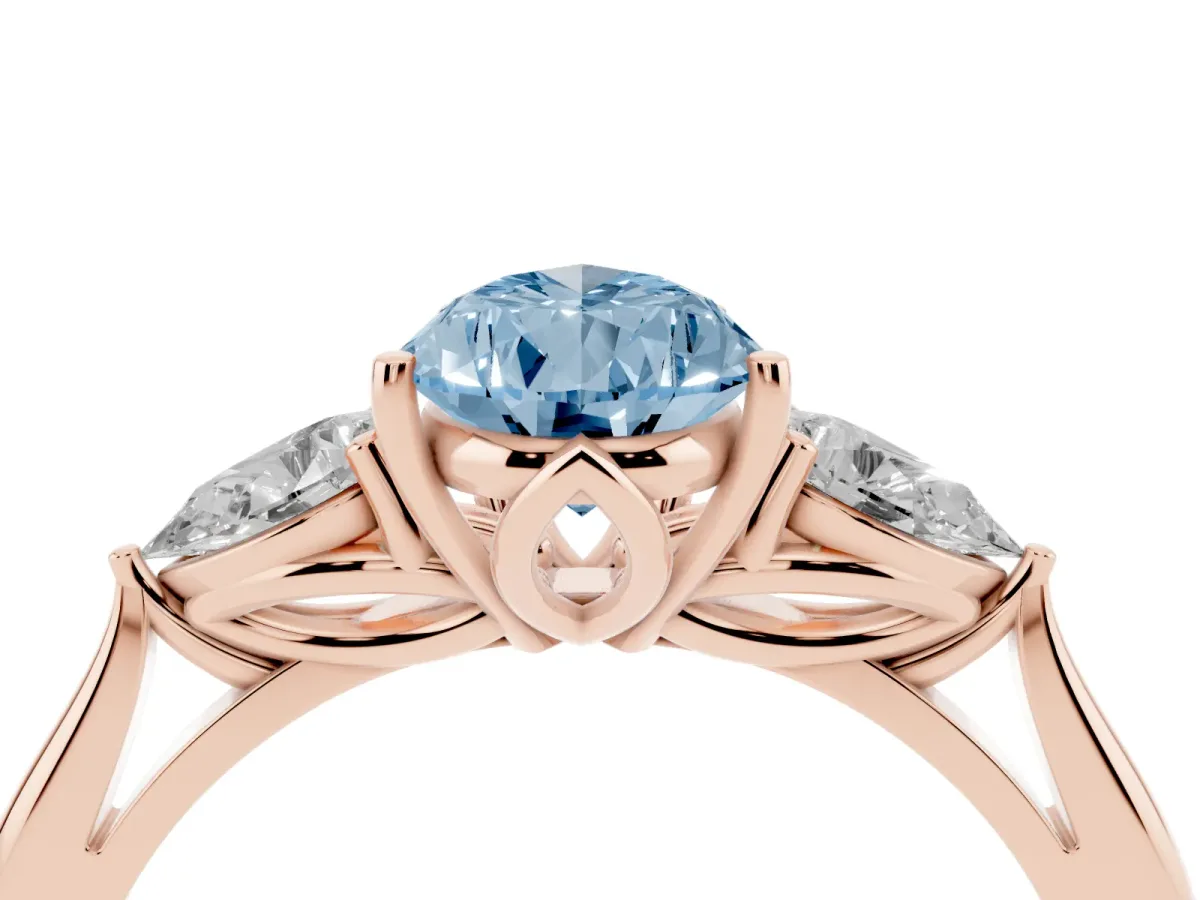 Fancy Blue Three-Stone Pear Cut Brilliant Diamond Solitaire Ring with Tapered Band and Four-Prong Setting Rose gold