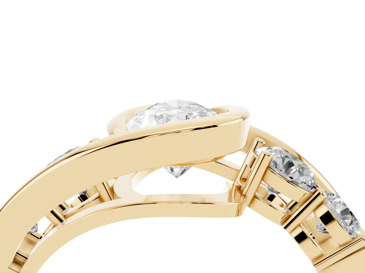 Bezel Set Pear Cut Diamond Bypass Ring with Round Accents Yellow gold