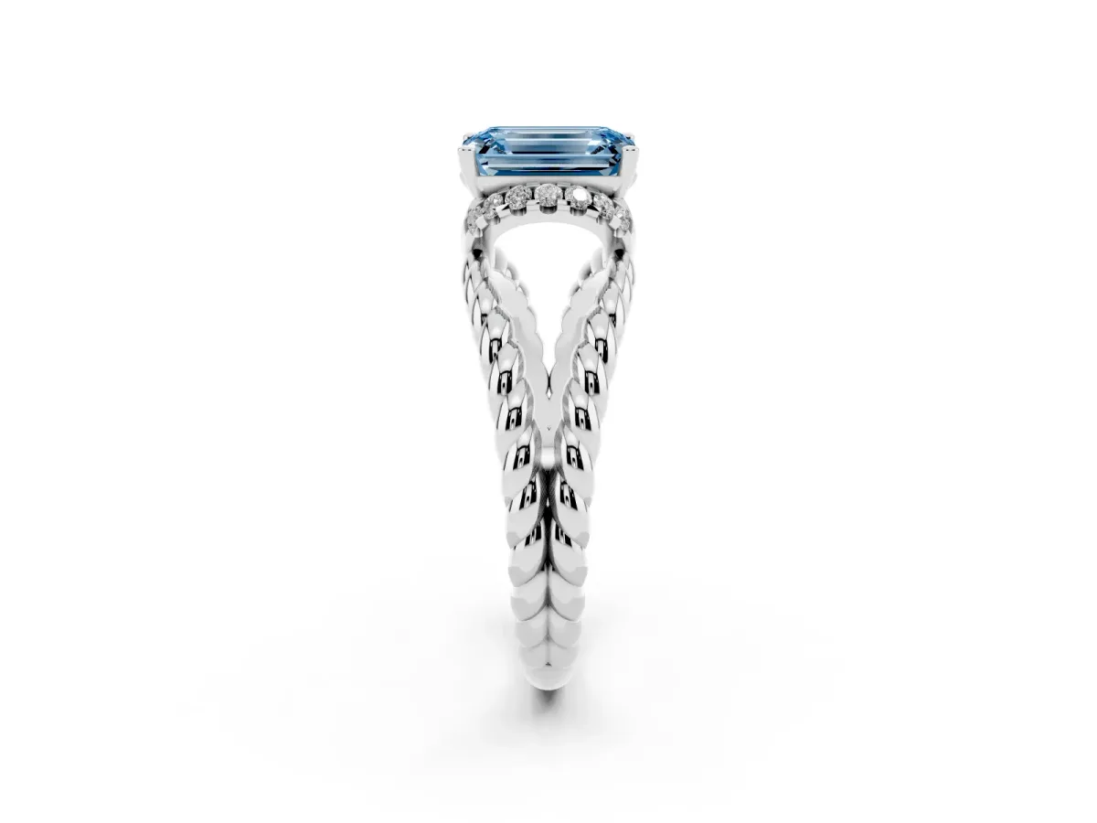 Fancy Blue Emerald Cut Halo Twisted Band Four-Prong Ring Silver