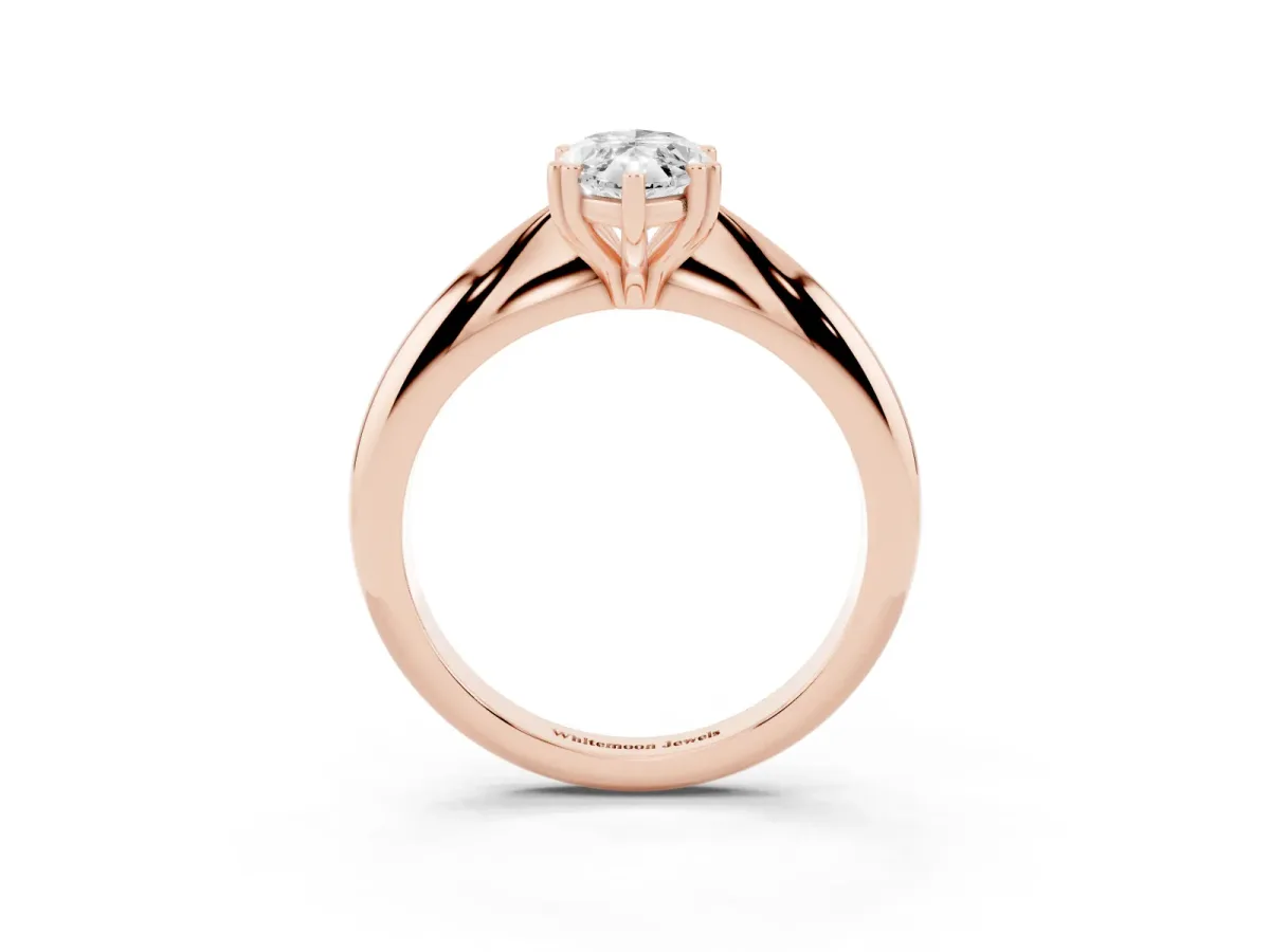 Marquise Cut Cut Solitaire Engagement Ring with Tapered Band and Four-Prong Setting Rose gold