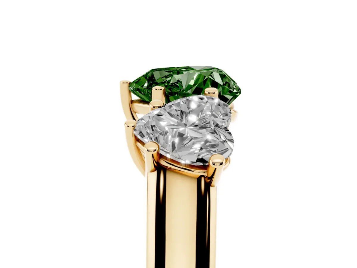Fancy Green Heart Cut Three-Stone Diamond Ring with Prong Setting on a Classic Band Yellow gold
