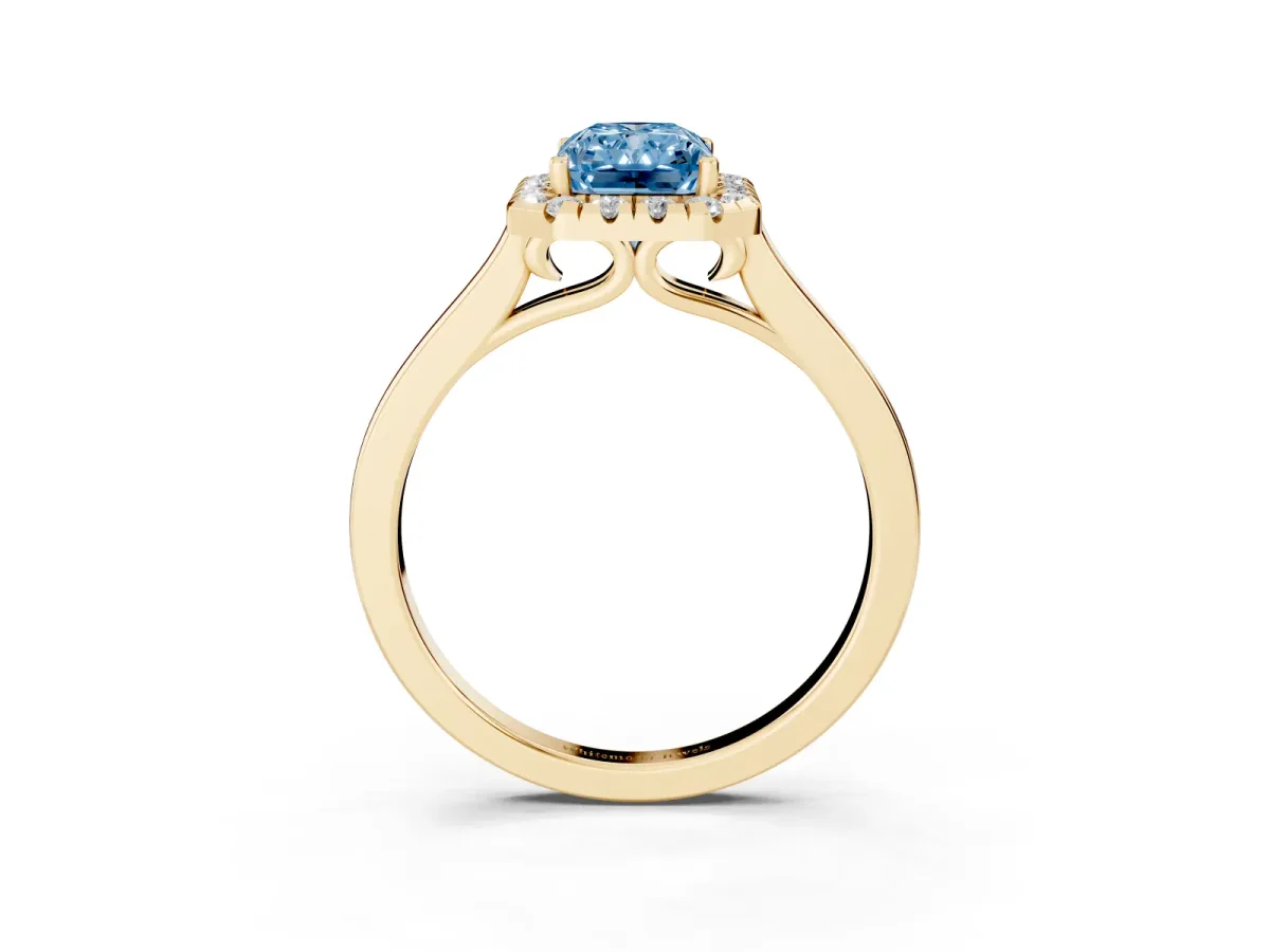Fancy Blue Radiant Cut Halo Round Diamond Solitaire Ring with Pavé Band and Four-Prong Setting Yellow gold