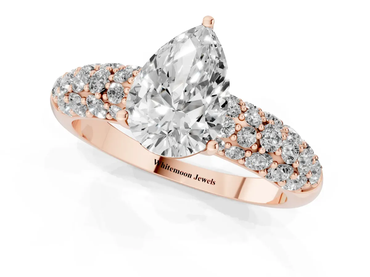 Pear Cut Diamond Pavé Band Solitaire Ring with Four-Prong Setting Rose gold