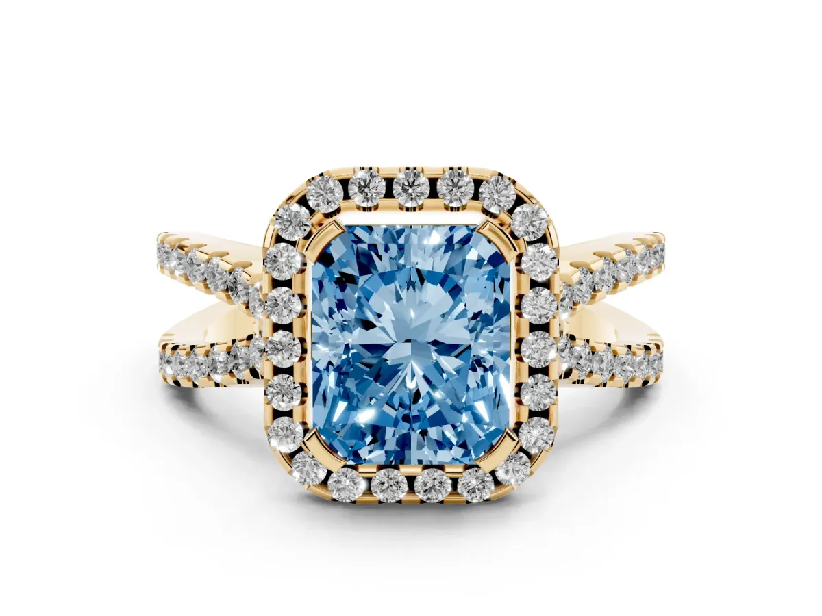Fancy Blue Radiant Cut Diamond Halo Ring with Split Shank Pavé Band and Prong Setting Yellow gold