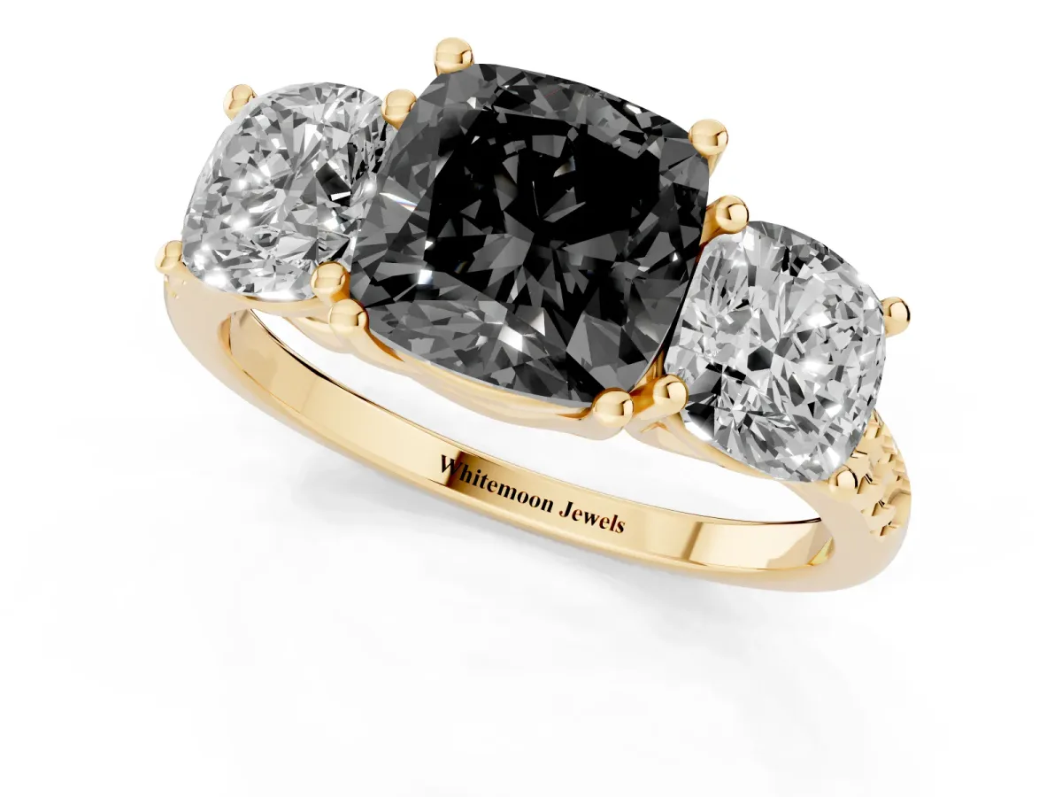 Fancy Black Three-Stone Cushion Cut Diamond Ring with Round Pavé Band and Prong Setting Yellow gold