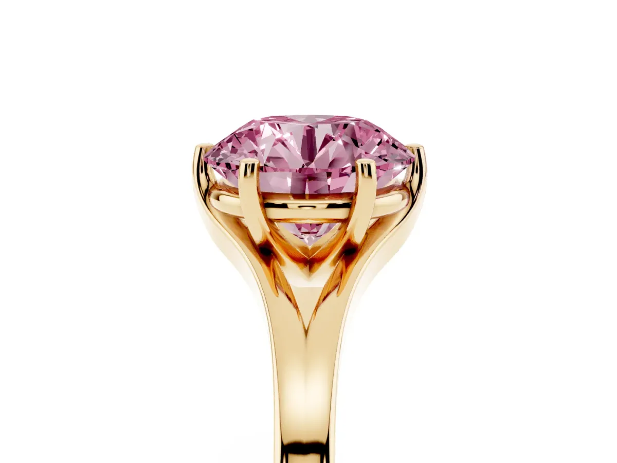 Fancy Pink Round Cut Solitaire Diamond Ring with Six-Prong Setting and Tapered Band Yellow gold