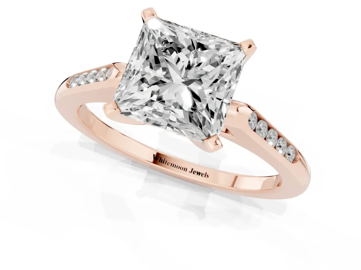 Princess Cut Diamond Solitaire Ring with Channel Set Round Band and Prong Setting Rose gold