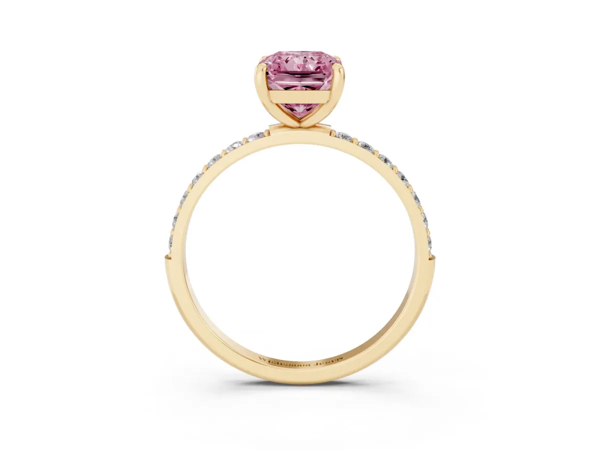 Fancy Pink Radiant Cut Diamond Solitaire Ring with Round Pavé Band and Prong Setting Yellow gold