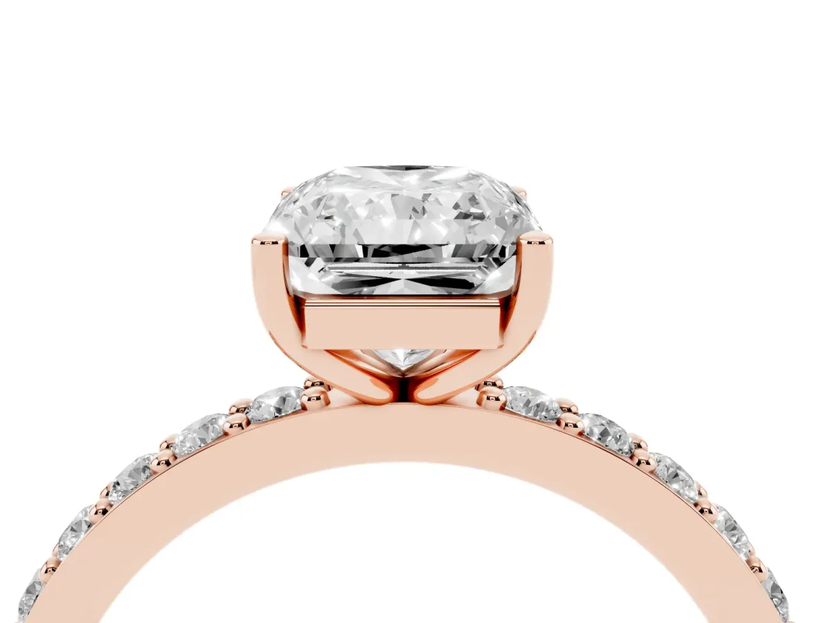 Radiant Cut Cut Diamond Solitaire with Pave Band and Four-Prong Setting Rose gold