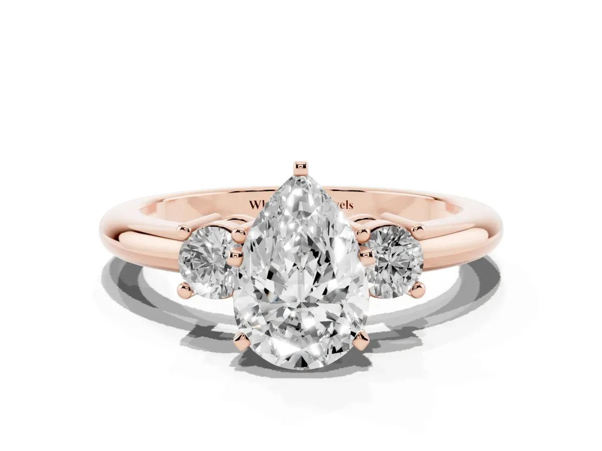 Three-Stone Pear Cut Cut Diamond Solitaire with Prong Setting and Classic Band Rose gold