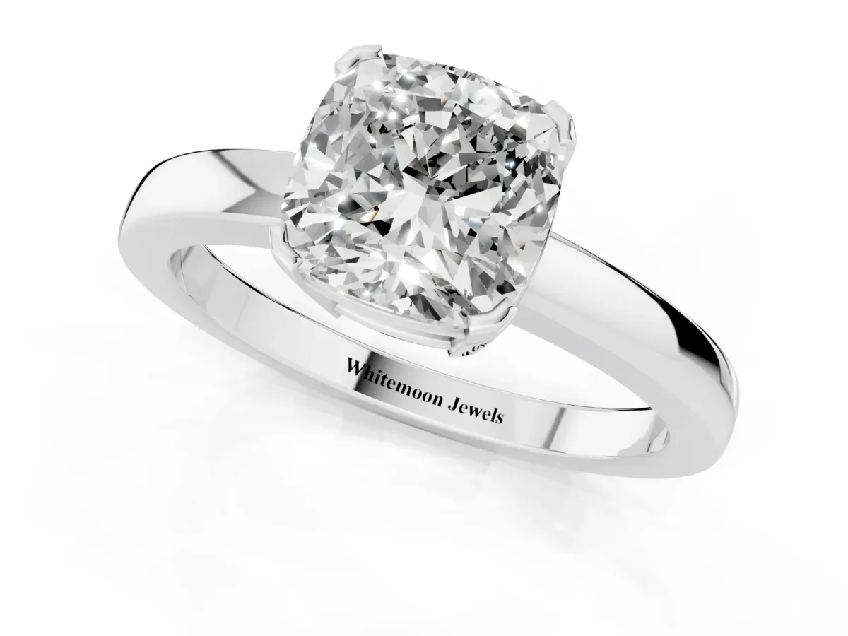 Cushion Cut Cut Solitaire Ring with Four-Prong Setting and Classic Band Silver