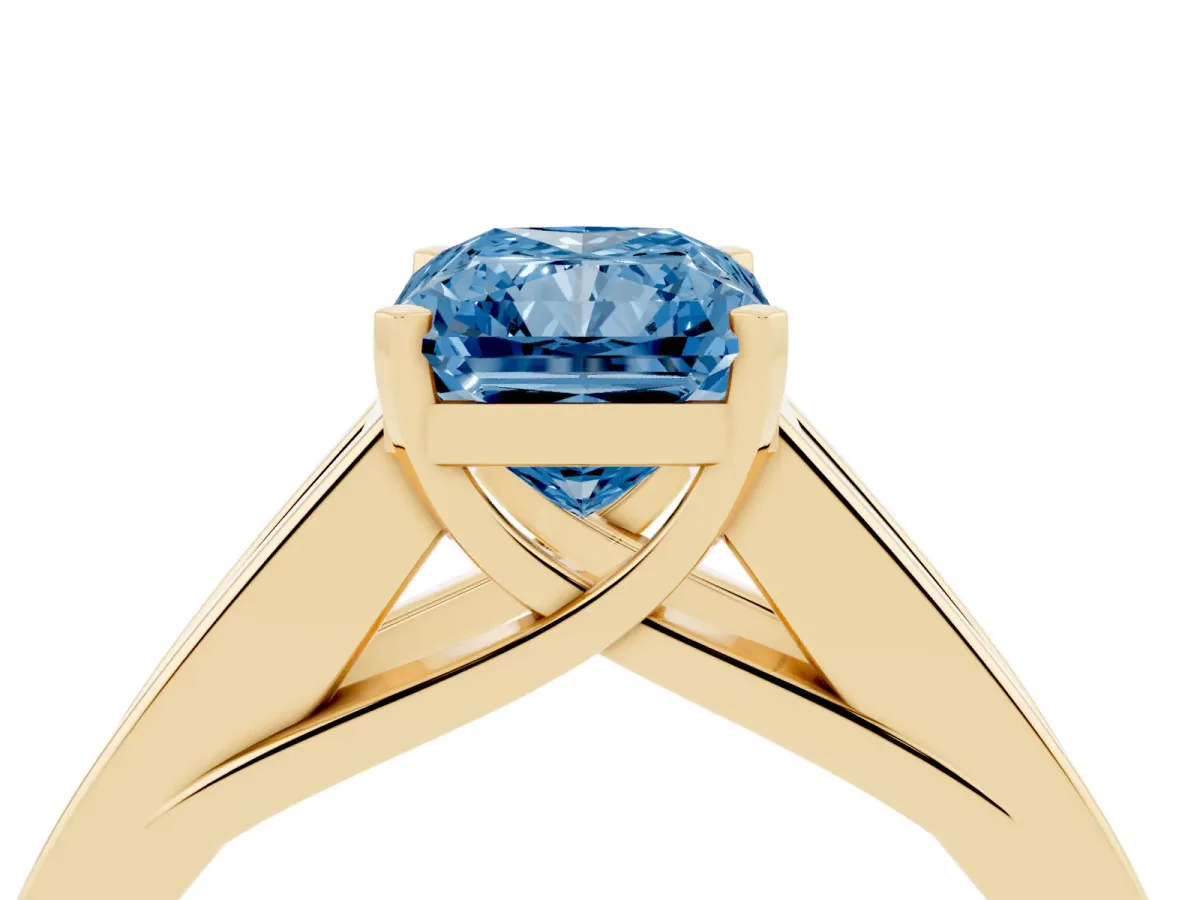 Fancy Blue Radiant Cut Cut Channel Set Solitaire Ring with Four-Prong Setting Yellow gold