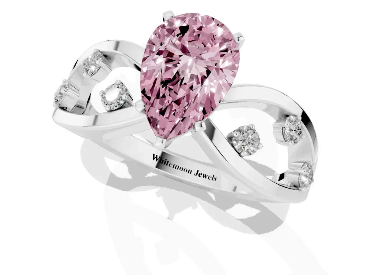 Fancy Pink Pear Cut Cut Solitaire Diamond with Side Stones on Criss-Cross Band and Four-Prong Setting Platinum