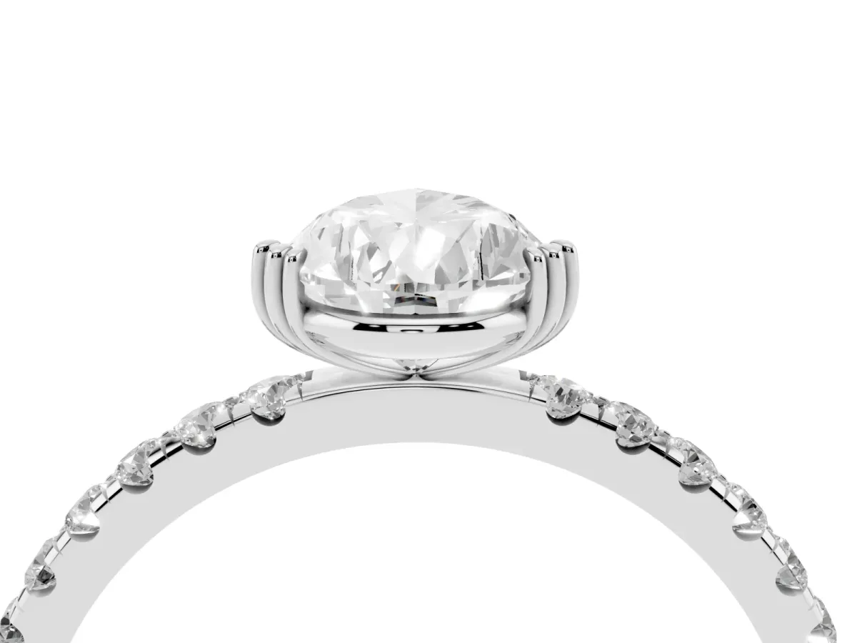 Pear Cut Brilliant Solitaire with Pavé Band and Claw Prong Setting Silver