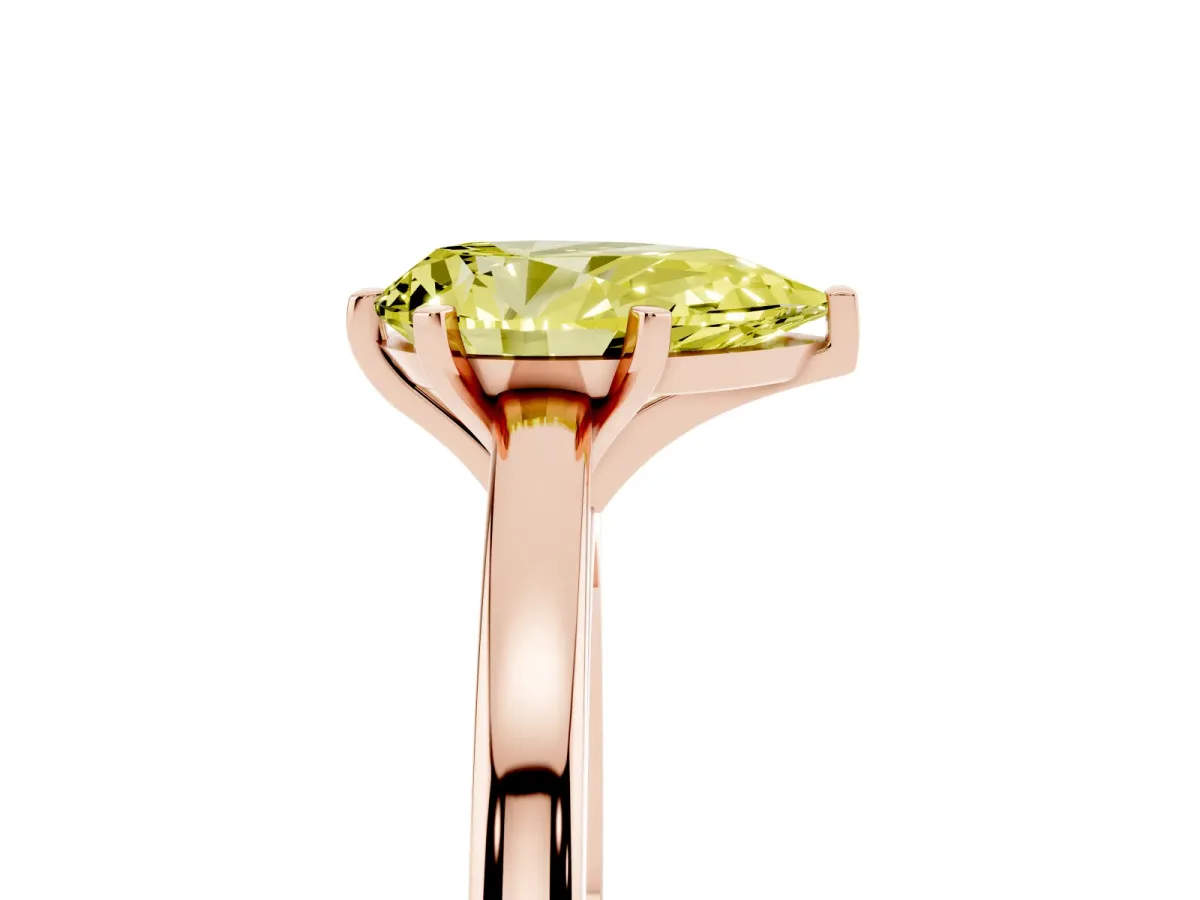 Fancy Yellow Pear Cut Solitaire Diamond Engagement Ring with Four-Prong Setting on a Classic Band Rose gold