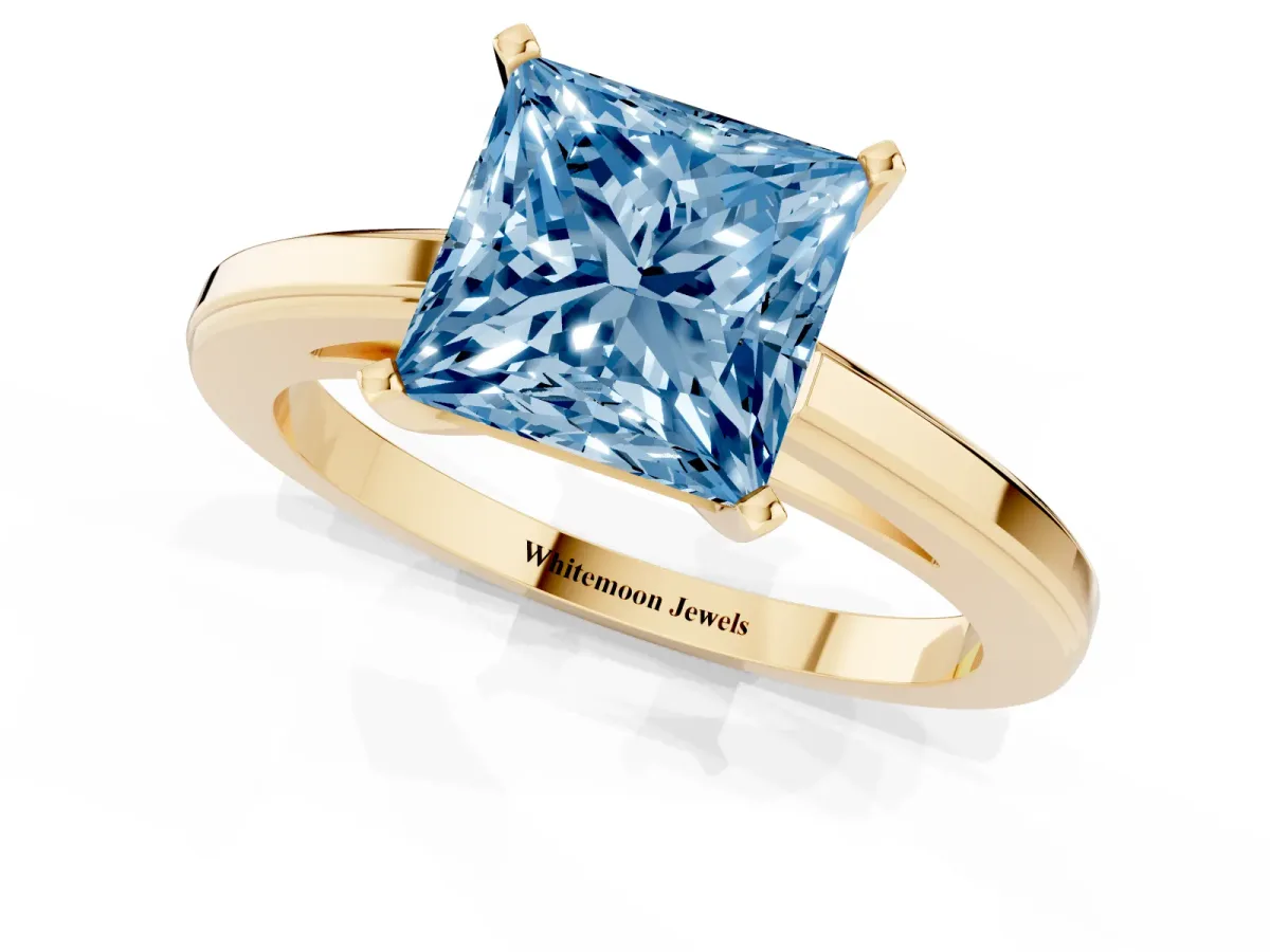 Fancy Blue Princess Cut Solitaire Diamond Ring with Four-Prong Setting and Classic Band Yellow gold