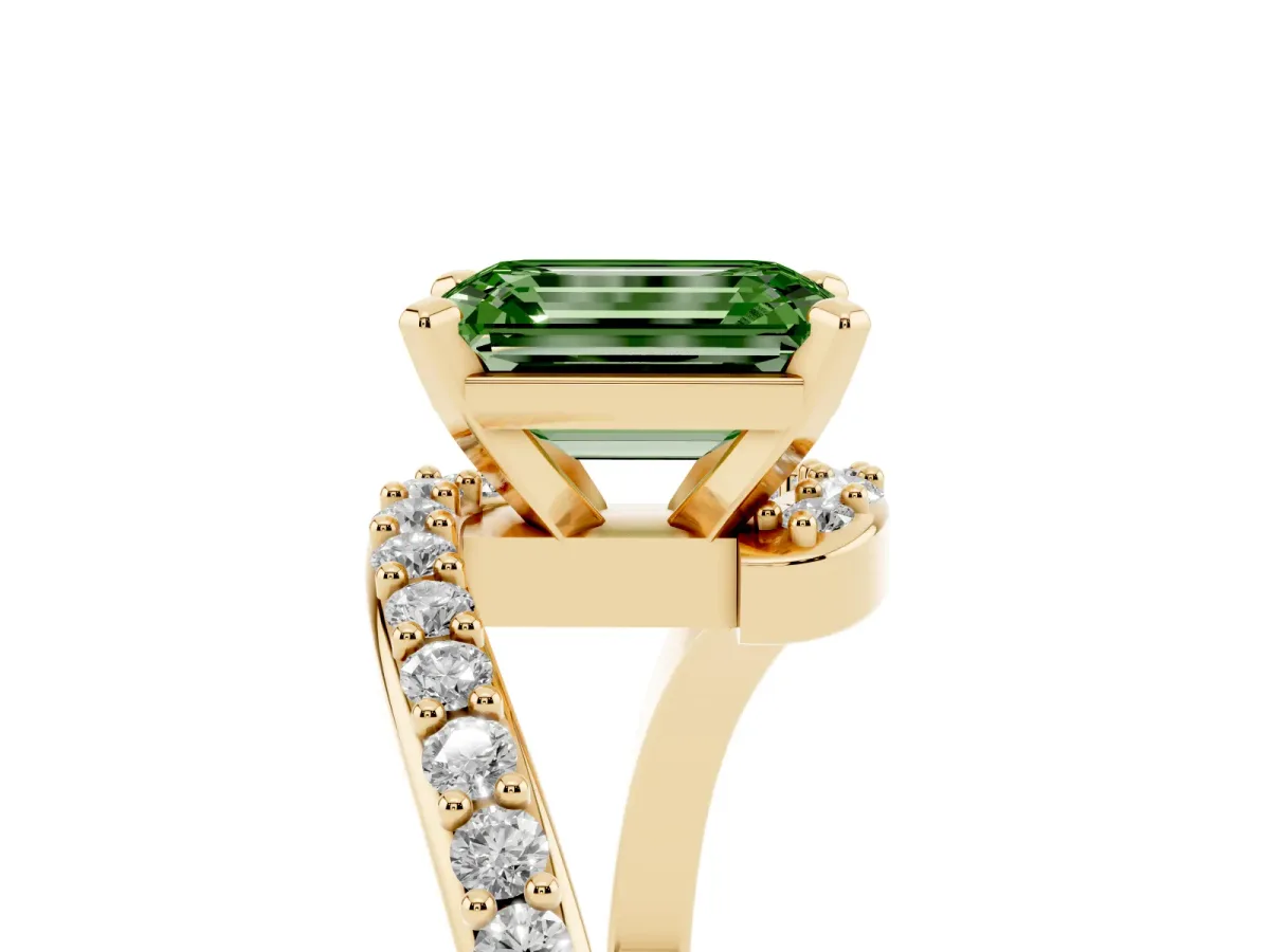 Fancy Green Emerald Cut Solitaire Twist Band with Pave Set Diamonds and Four-Prong Setting Yellow gold