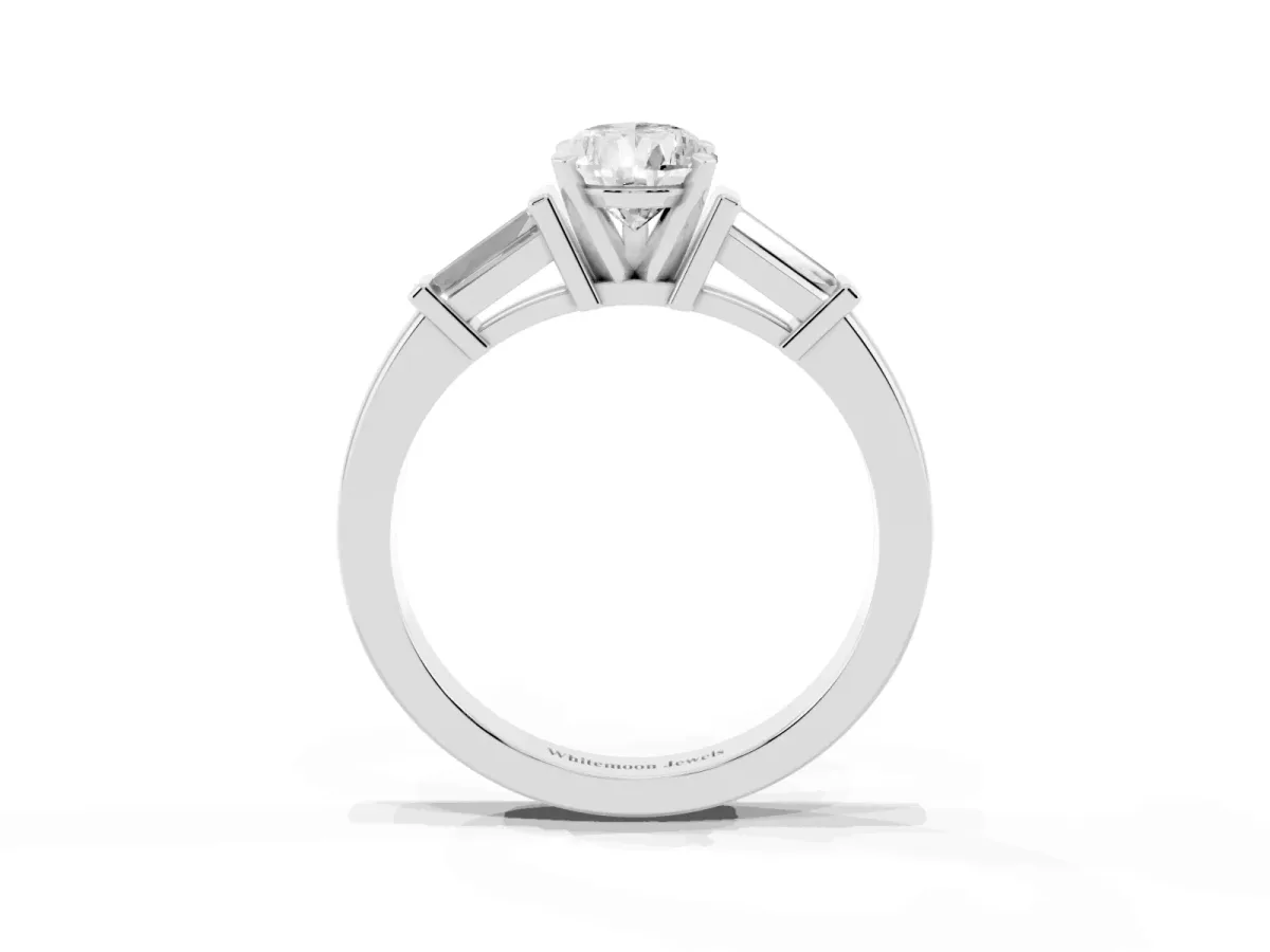 Pear Cut Cut Diamond Solitaire Ring with Tapered Baguette Accents and Four-Prong Setting White gold