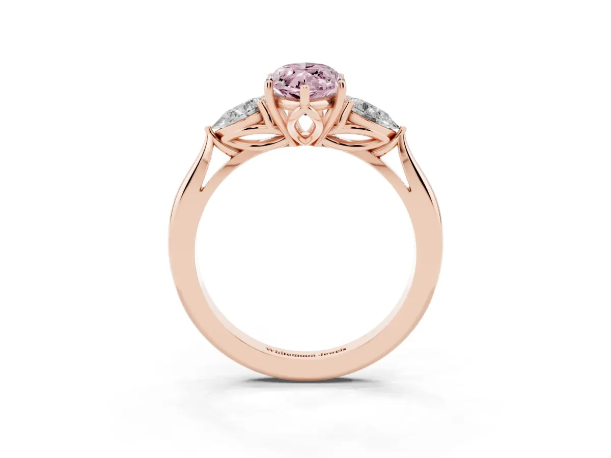 Fancy Pink Three-Stone Marquise Cut Diamond Ring with Pear Side Stones in Four-Prong Setting Rose gold