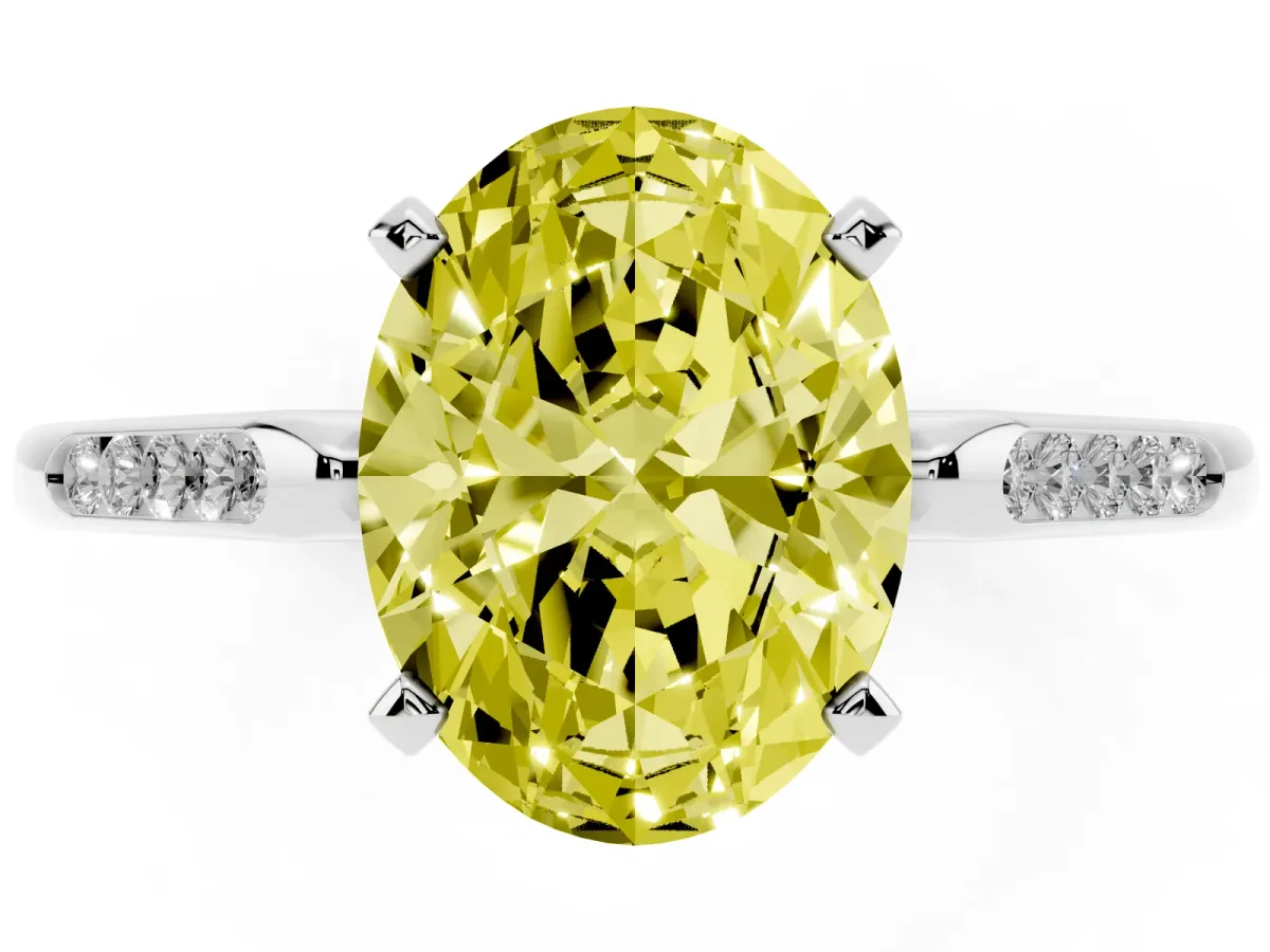 Fancy Yellow Oval Cut Diamond Solitaire Ring with Channel Set Round Band and Prong Setting Silver