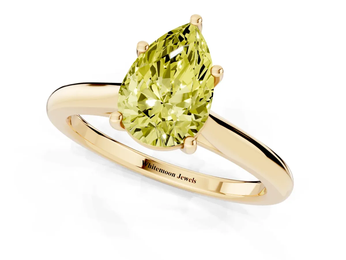 Fancy Yellow Pear Cut Cut Solitaire Ring with Cathedral Band and Four-Prong Setting Yellow gold