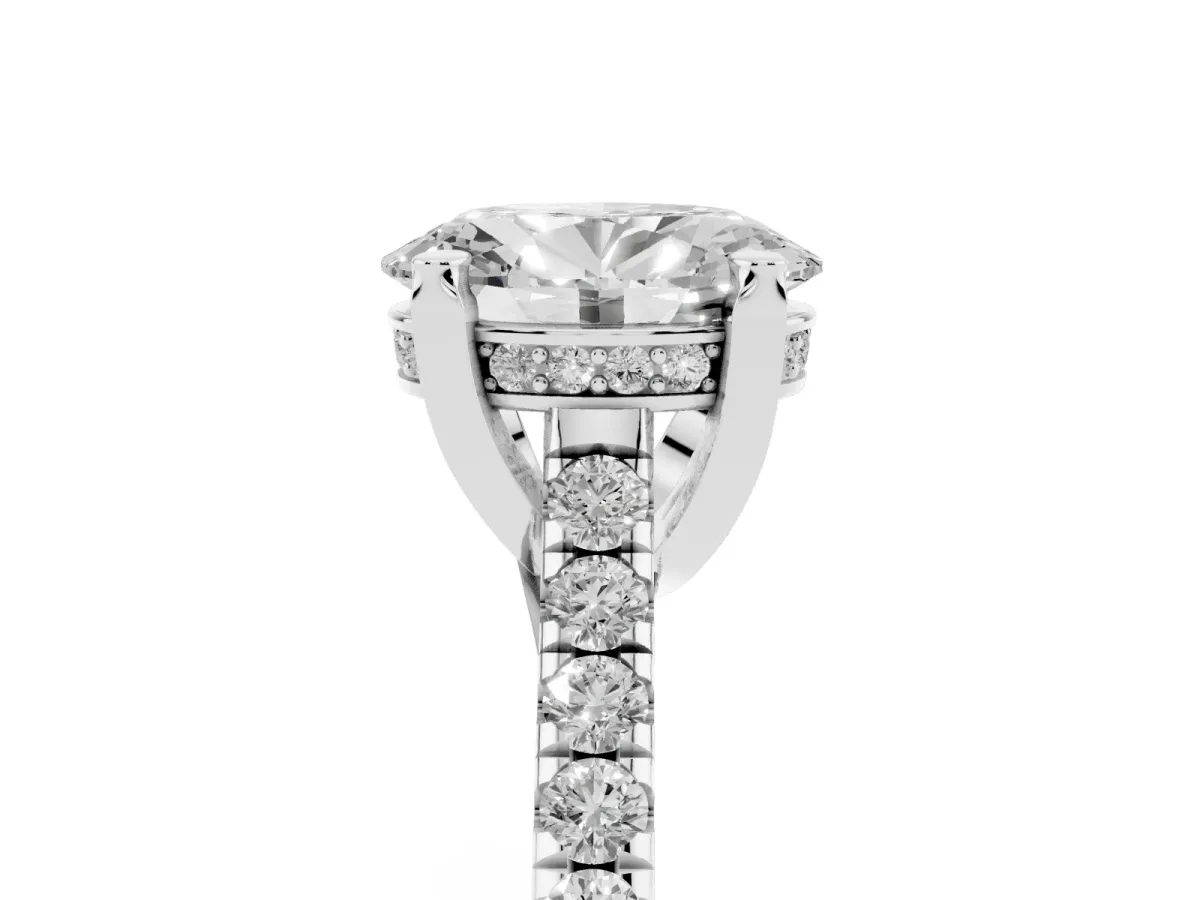 Oval Cut Brilliant Diamond Solitaire with Pavé Band and Four-Prong Setting Silver
