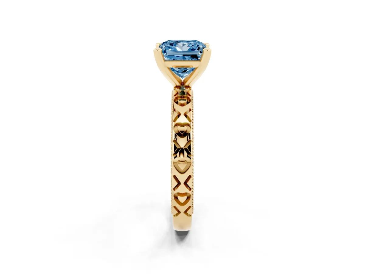 Fancy Blue Princess Cut Solitaire Diamond Engagement Ring with XO Engraved Band and Four-Prong Setting Yellow gold
