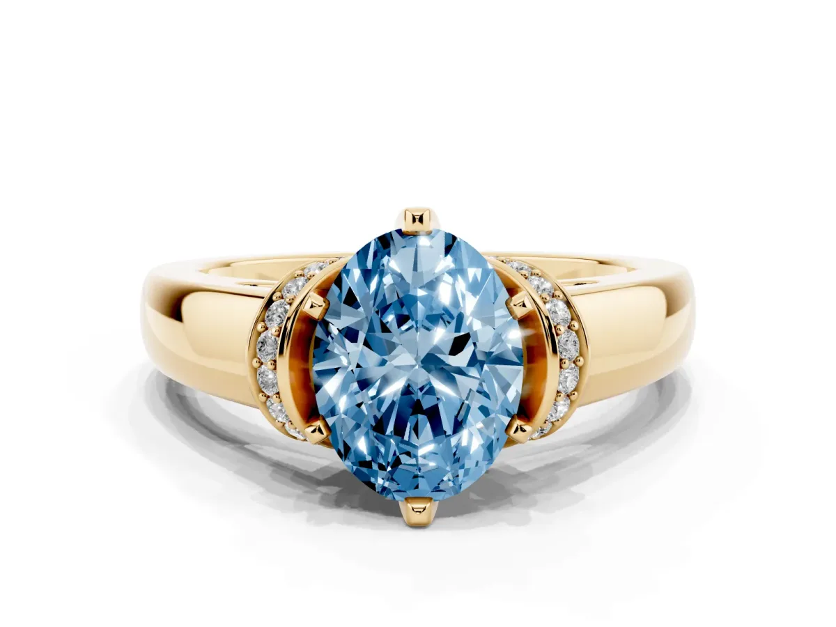 Fancy Blue Oval Cut Solitaire Diamond Ring with Pave Band and Six-Prong Setting Yellow gold
