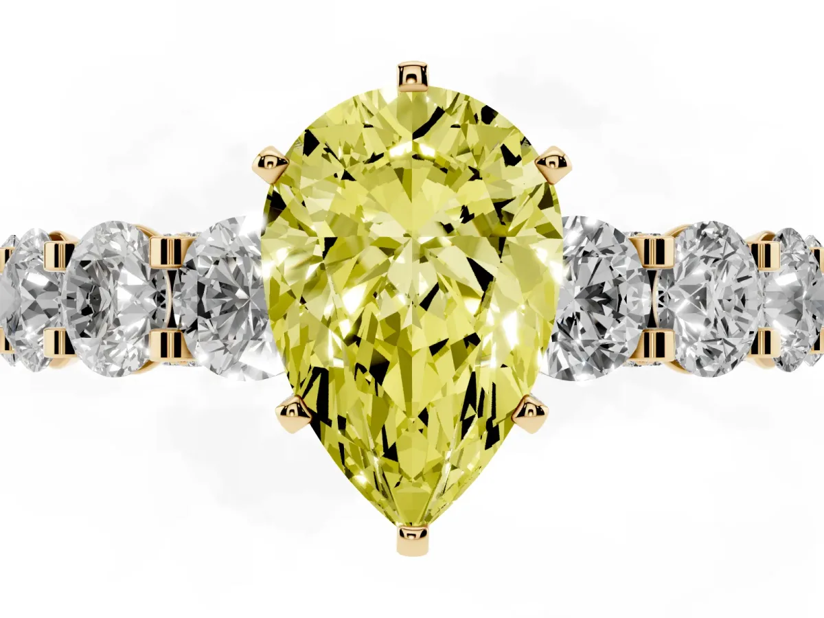 Fancy Yellow Pear Cut Diamond Side Stone Engagement Ring with Four-Prong Setting Yellow gold
