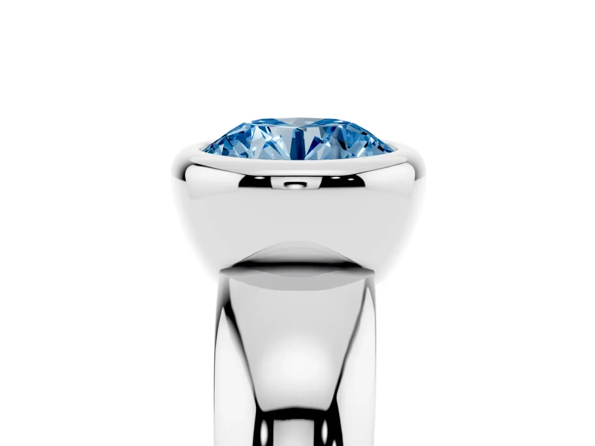 Fancy Blue Bezel Set Round Cut Solitaire Ring with Wide Band Platinum