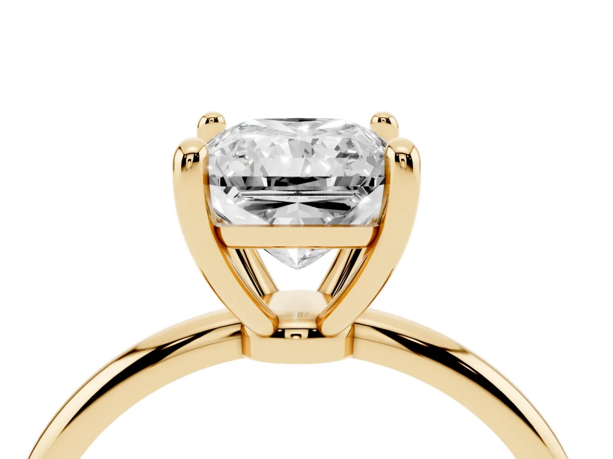 Radiant Cut Solitaire Diamond Ring with 4-Prong Setting on a Classic Band Yellow gold