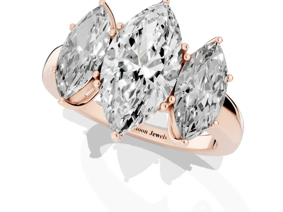 Marquise Cut Diamond Three-Stone Ring with Four-Prong Setting and Classic Band Rose gold
