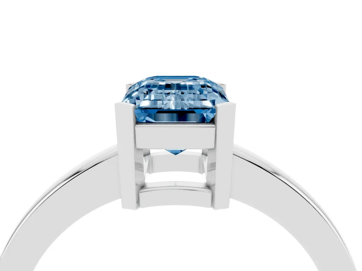 Fancy Blue Emerald Cut Cut Solitaire Ring with Four-Prong Setting and Classic Band Silver