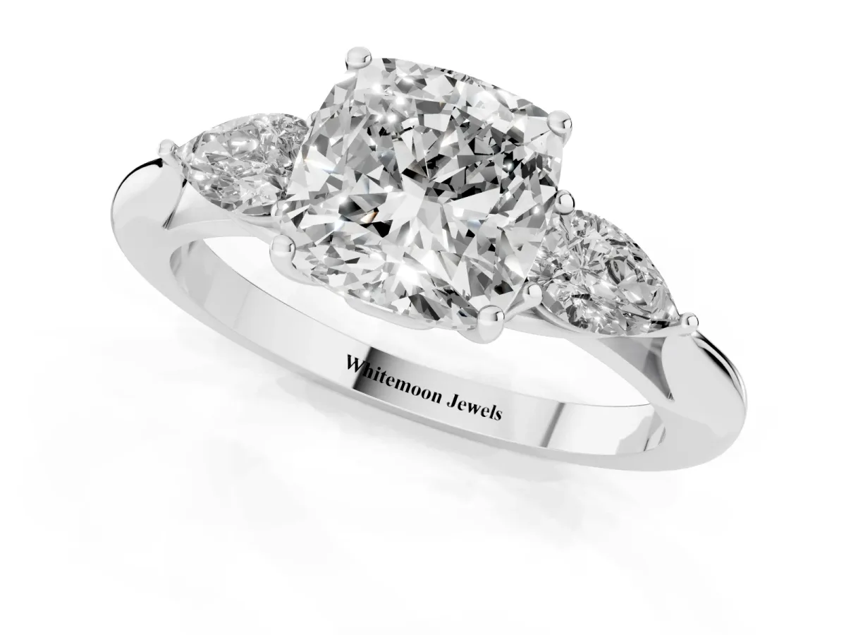 Three-Stone Cushion Cut Diamond Ring with Pear Side Stones in Four-Prong Setting Silver
