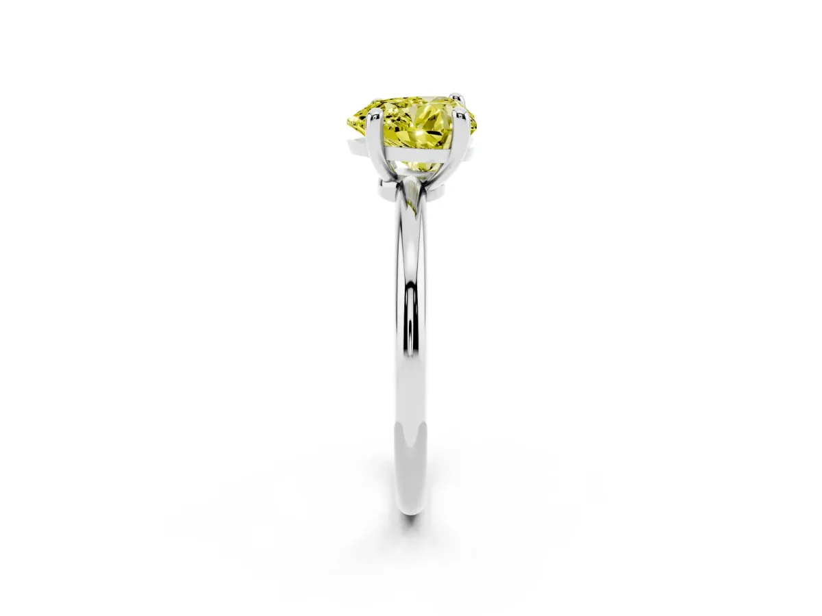Fancy Yellow Heart Cut Solitaire Diamond Ring with 4-Prong Setting on a Classic Band Silver