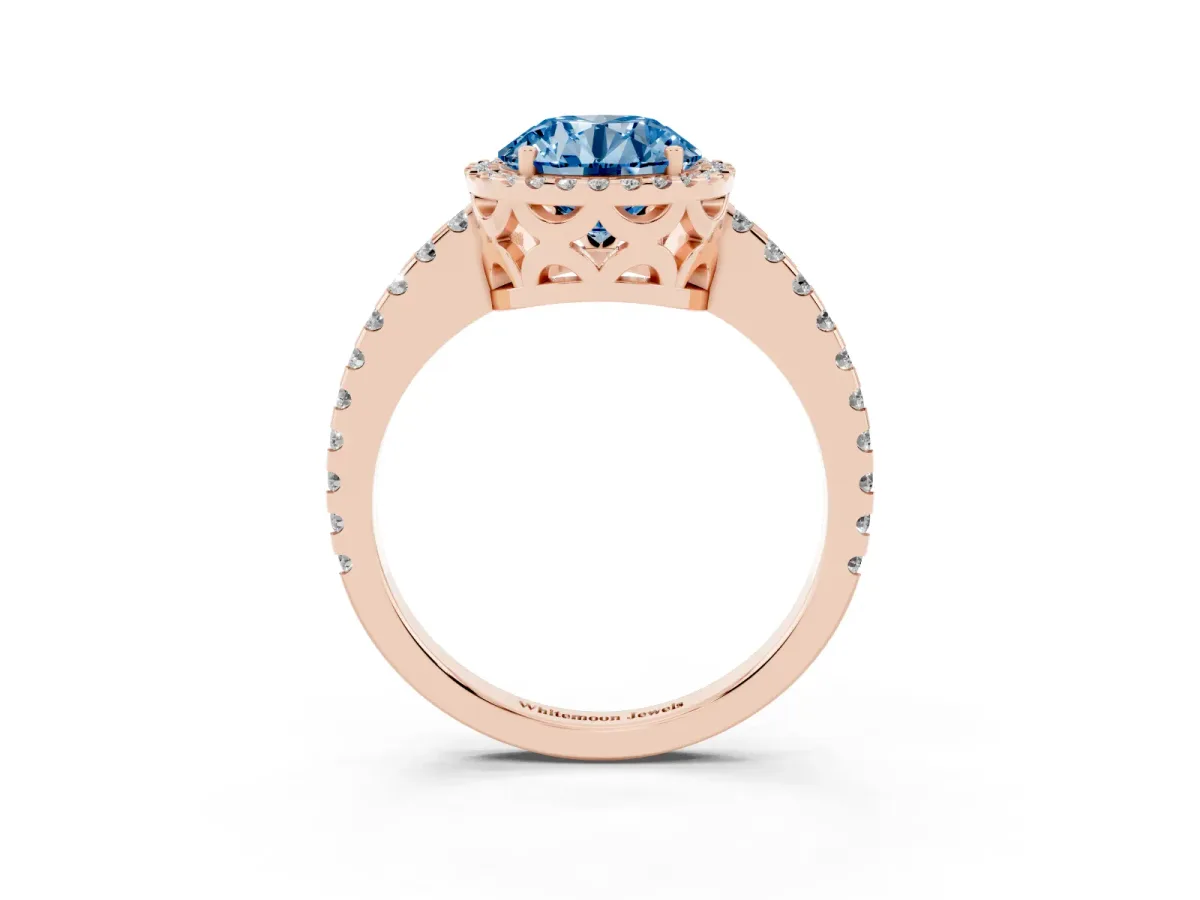 Fancy Blue Round Cut Diamond Halo Engagement Ring with Pavé Band and Prong Setting Rose gold