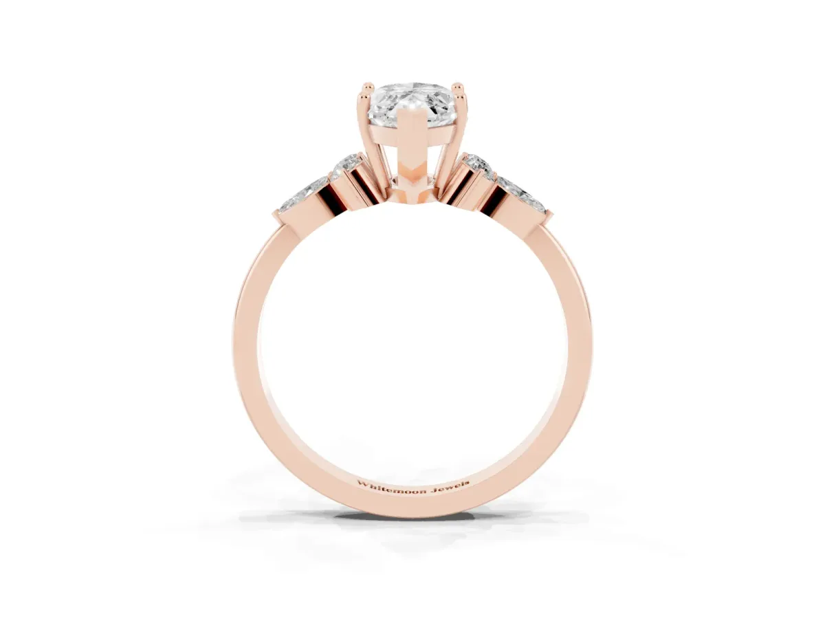 Marquise Cut Brilliant Diamond Solitaire Ring with Pear Side Stones and Four-Prong Setting Rose gold