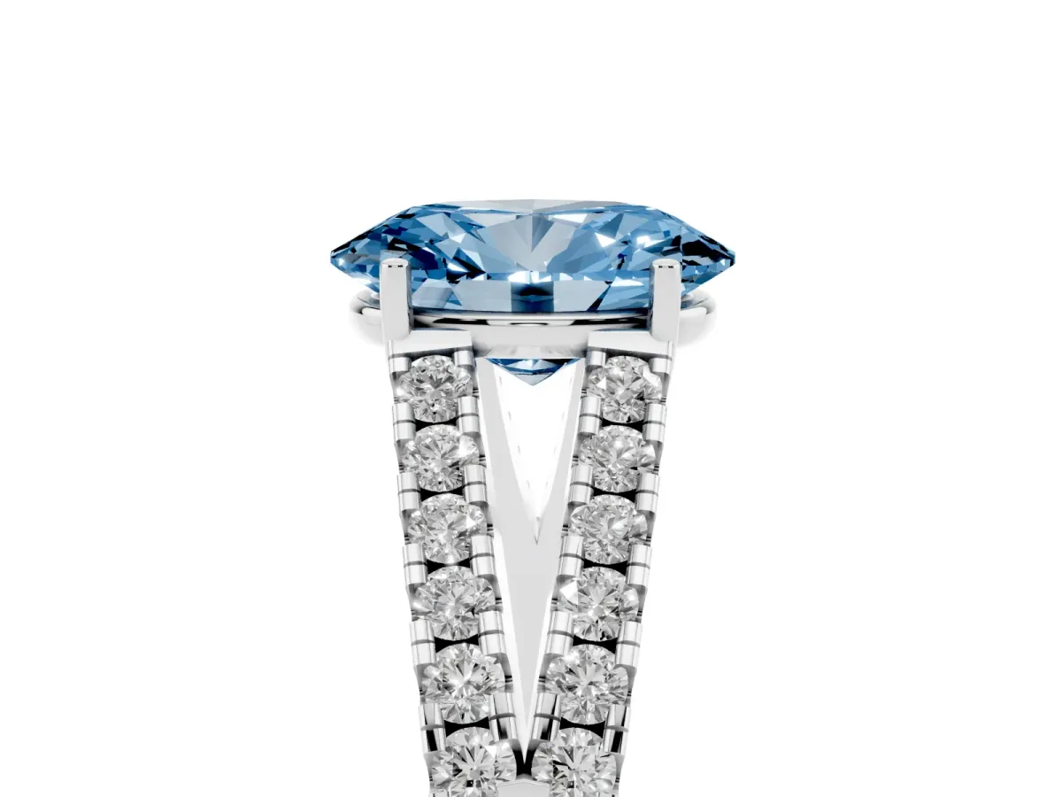 Fancy Blue Oval Cut Diamond Split Shank Pavé Engagement Ring with Four-Prong Setting Silver
