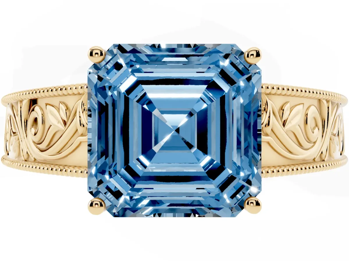 Fancy Blue Asscher Cut Diamond Solitaire Ring with Engraved Band and Four-Prong Setting Yellow gold