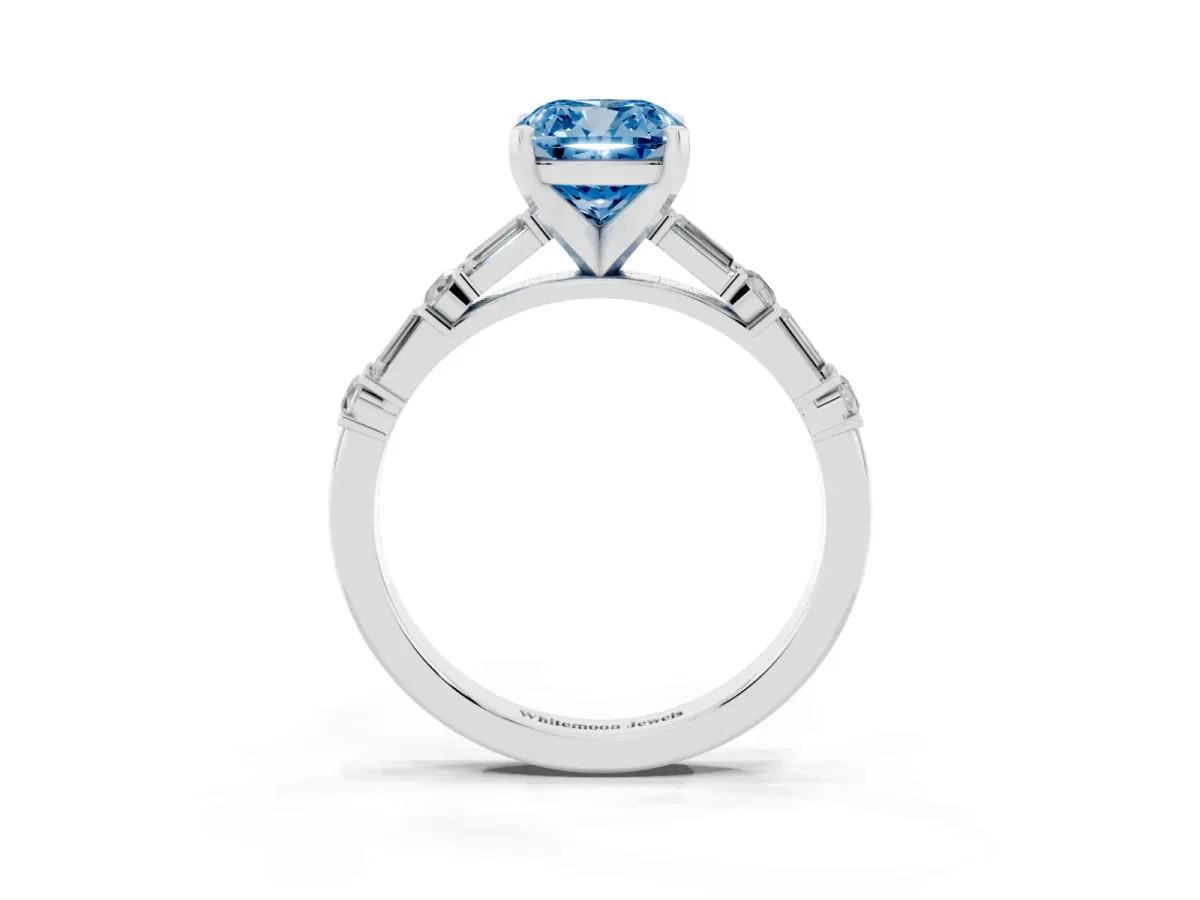 Fancy Blue Cushion Cut Diamond Solitaire with Side Baguettes and Channel Set Band Platinum