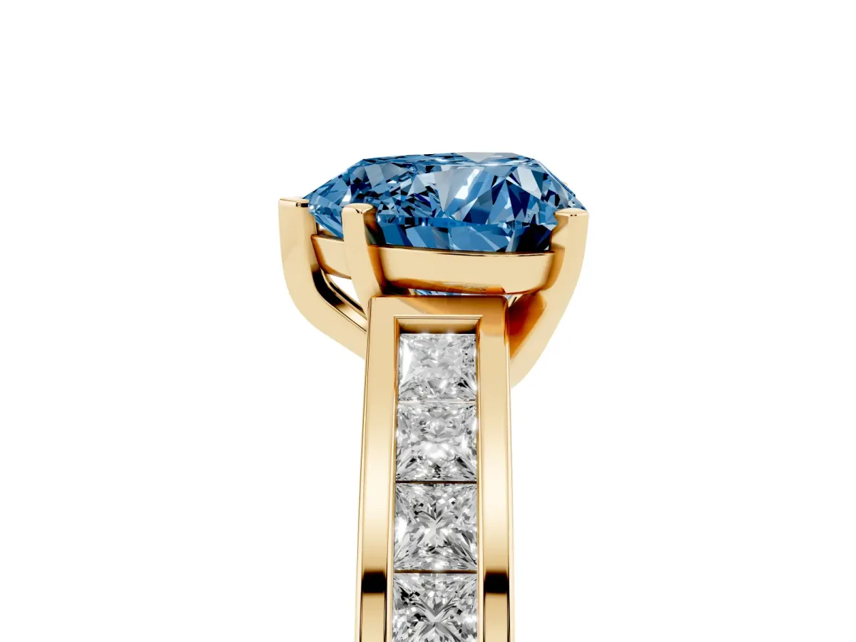 Fancy Blue Heart Cut Solitaire Diamond Ring with Channel-Set Band and Four-Prong Setting Yellow gold