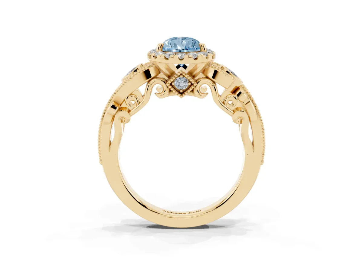Fancy Blue Pear Cut Diamond Halo Ring with Milgrain Pavé Band and Four-Prong Setting Yellow gold