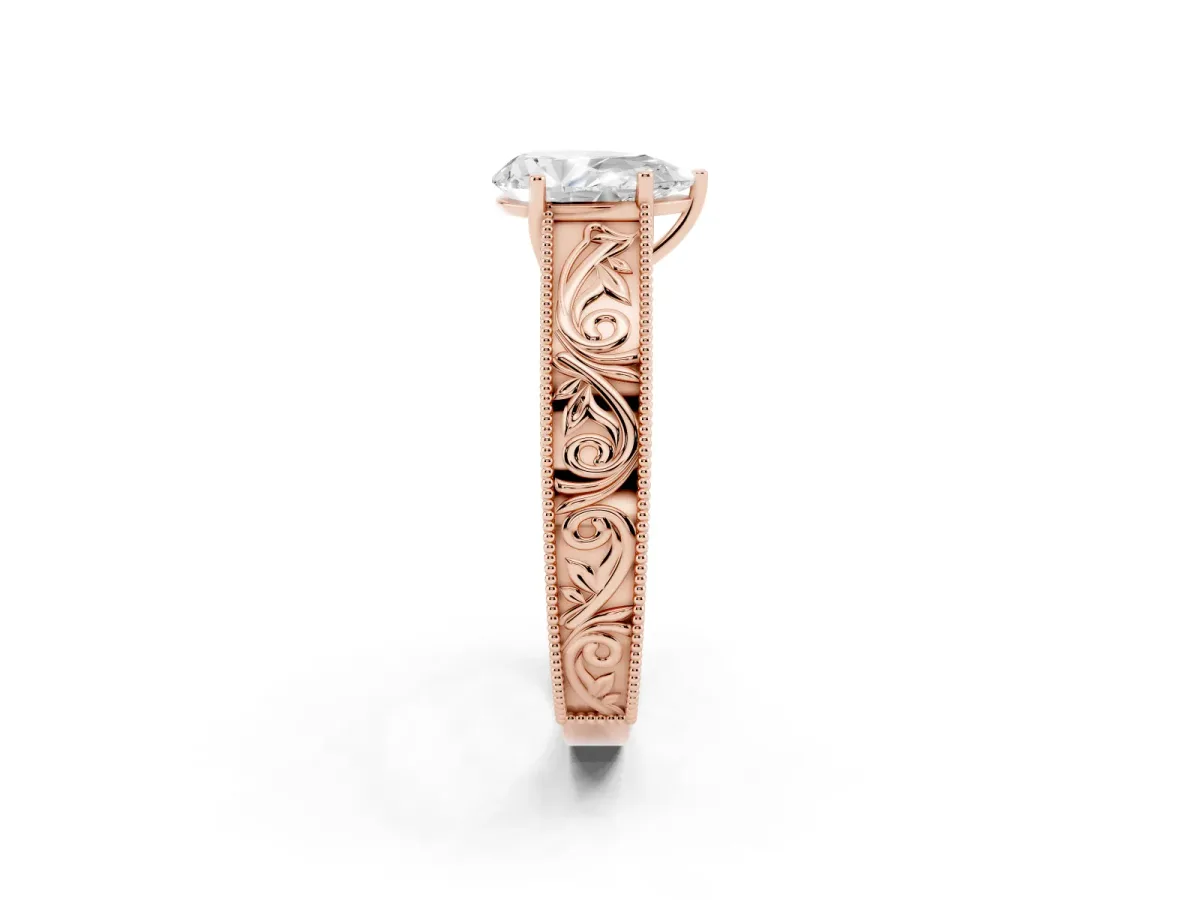 Pear Cut Diamond Solitaire Ring with Engraved Band and Four-Prong Setting Rose gold