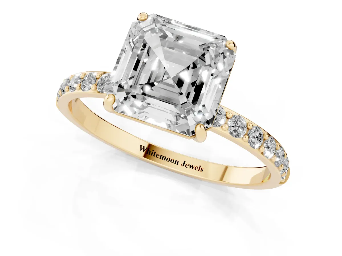 Asscher Cut Diamond Solitaire Ring with Round Pavé Shoulders and Prong Setting Yellow gold