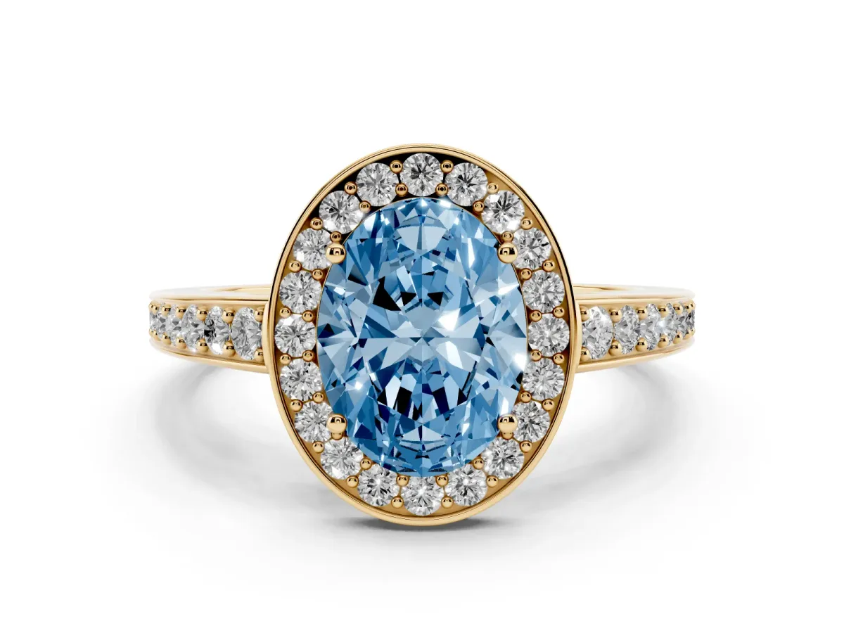 Fancy Blue Oval Cut Halo Pavé Diamond Engagement Ring with Bezel Setting Yellow gold