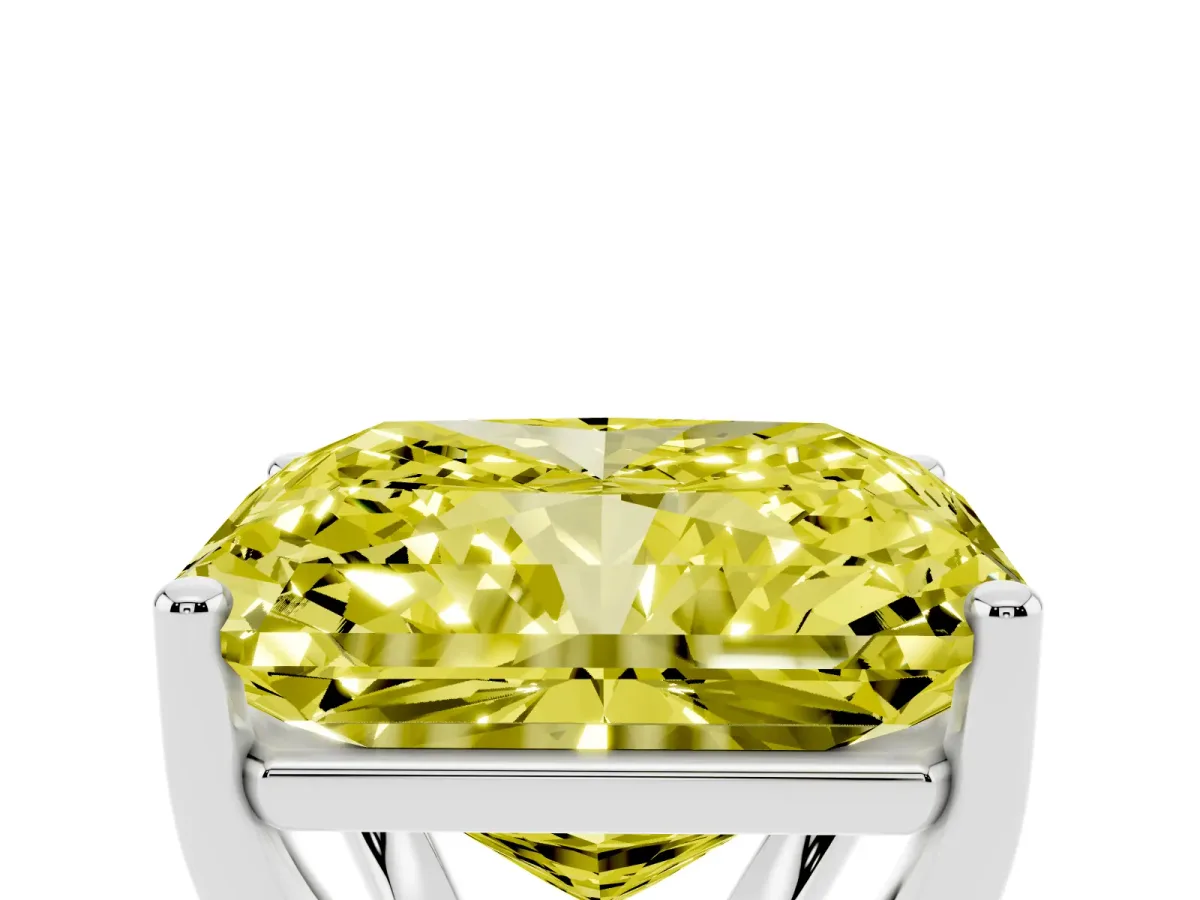 Fancy Yellow Radiant Cut Cut Diamond Solitaire Engagement Ring with Tapered Plain Band and Four-Prong Setting Silver