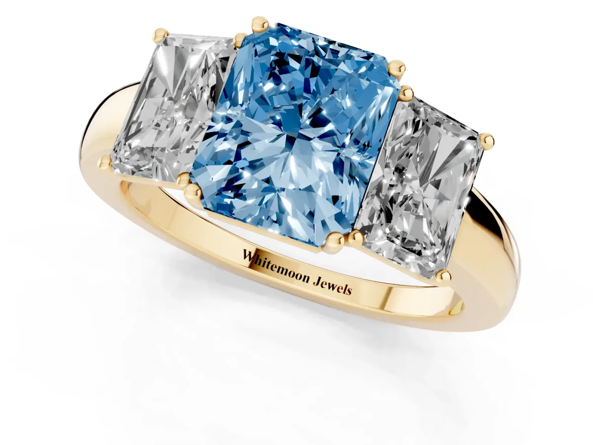 Fancy Blue Radiant Cut Diamond Three-Stone Ring with Four-Prong Setting and Classic Band Yellow gold